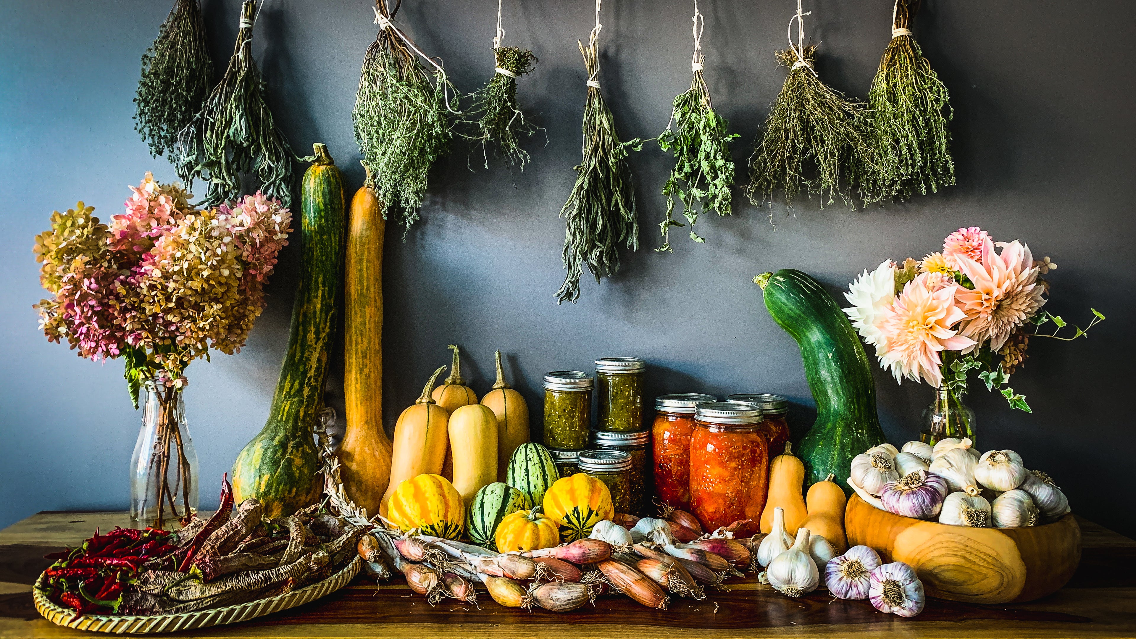 Buffet covered in preserved harvests